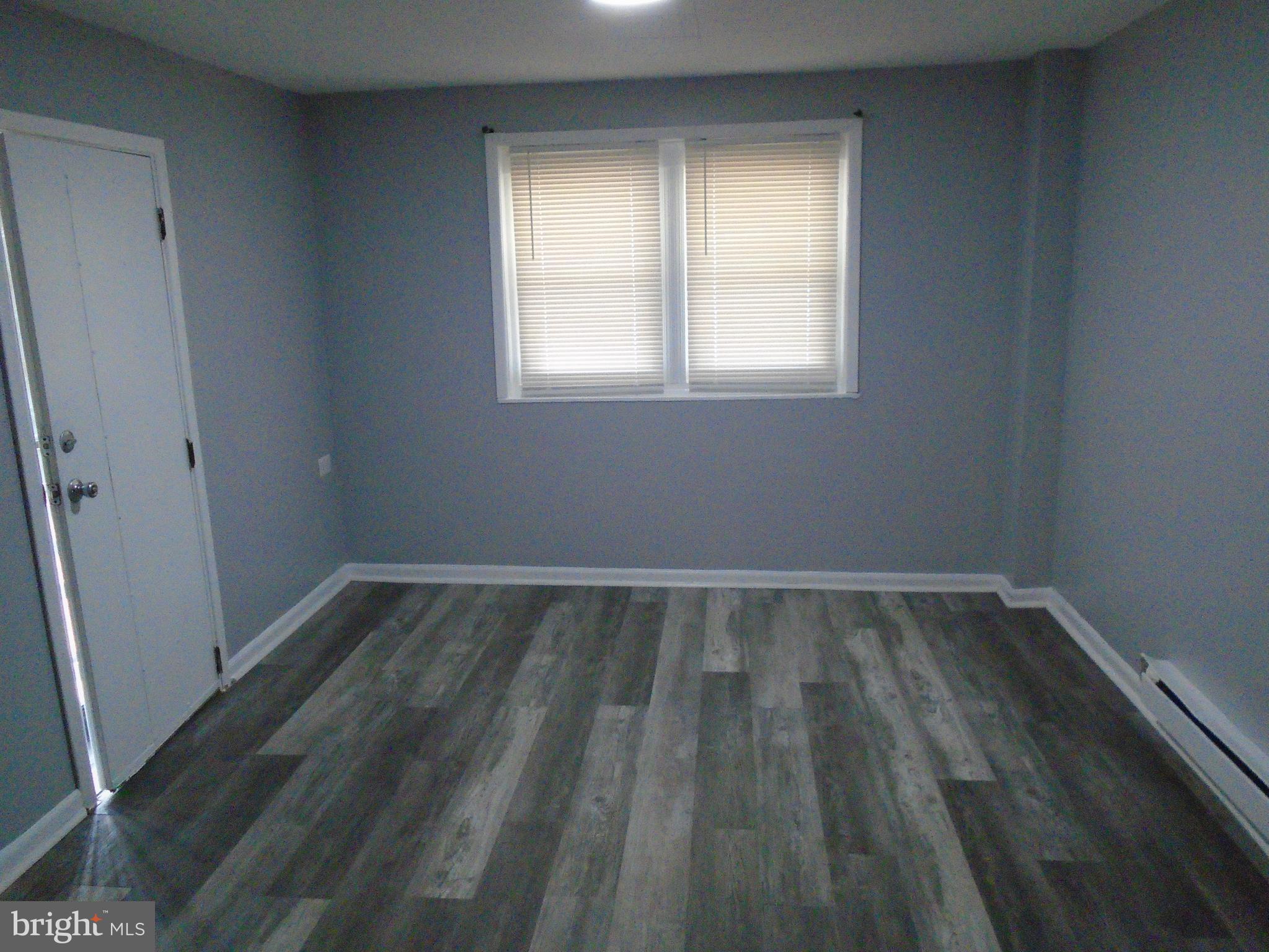 422 Wampler Road Baltimore, MD 21220 - Photo 8 of 10 an empty room with a window