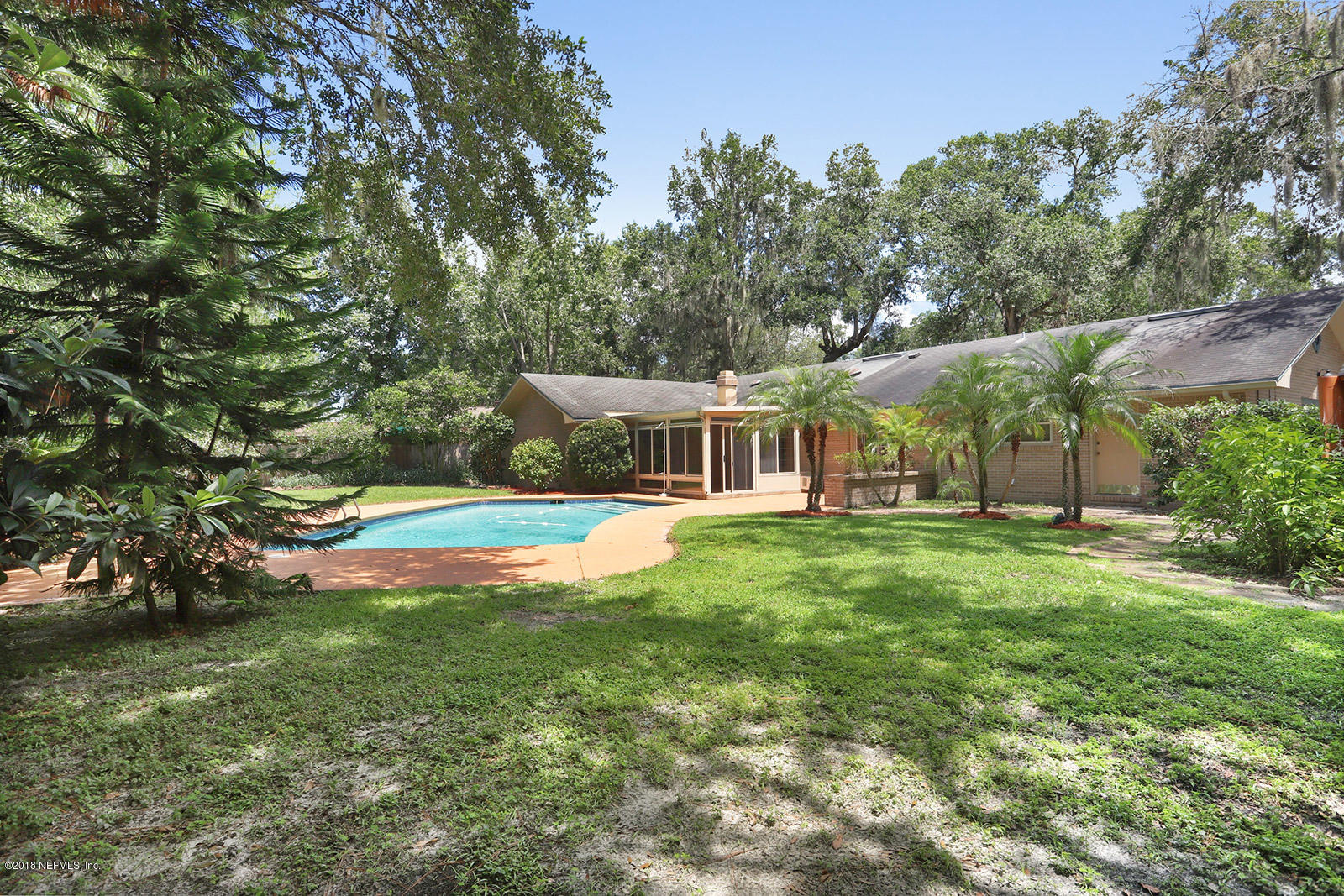 9482 Wexford Road Jacksonville, FL 32257 - Photo 16 of 25 a view of a house with a yard balcony and swimming pool