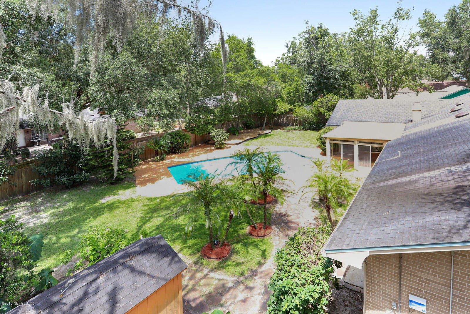 9482 Wexford Road Jacksonville, FL 32257 - Photo 19 of 25 a view of house with yard and outdoor seating