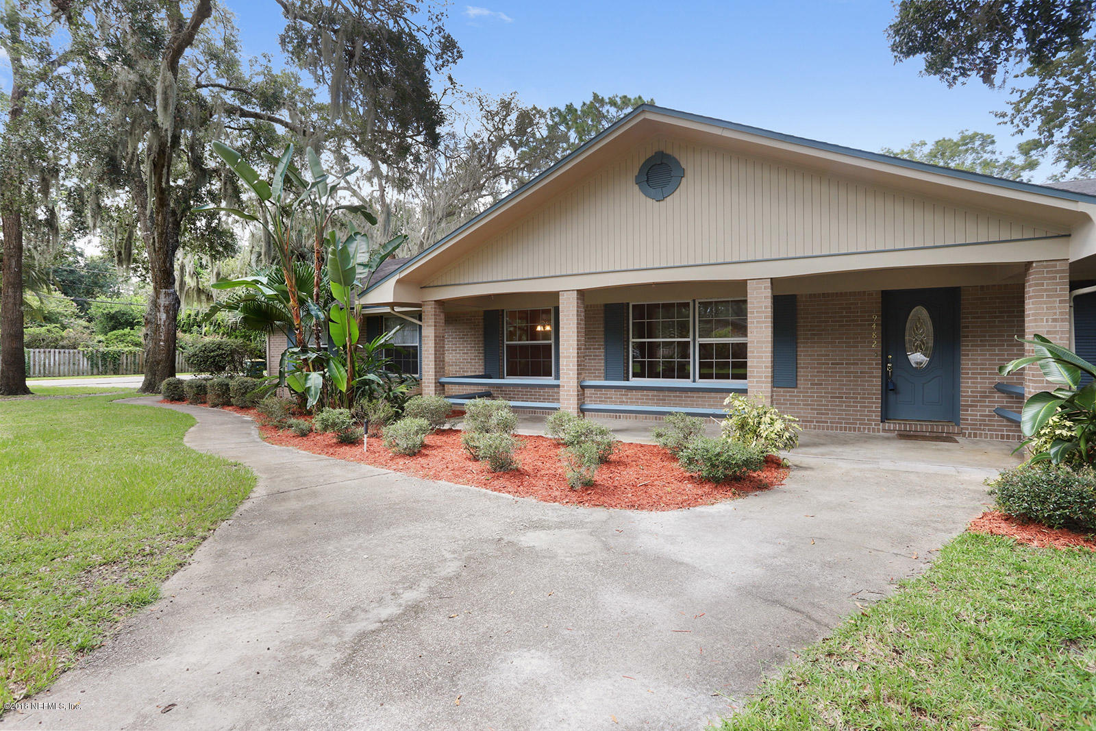 9482 Wexford Road Jacksonville, FL 32257 - Photo 2 of 25 a front view of a house with a yard