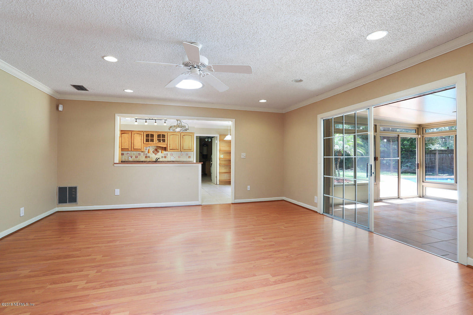 9482 Wexford Road Jacksonville, FL 32257 - Photo 6 of 25 a view of an empty room with a window