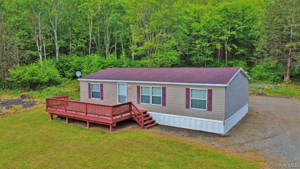 308 William Brown Road Fremont, NY 12741 - Photo 3 of 33 a view of a house with a yard and sitting area
