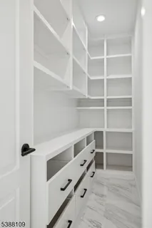 a room with storage and utility room