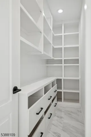 a room with storage and utility room