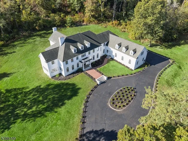 an aerial view of a house with garden space