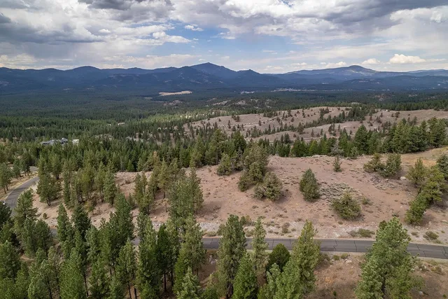 a view of lake and mountains