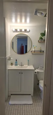 a bathroom with a sink and a toilet