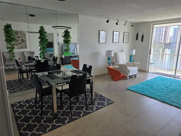 a view of a livingroom and dining room