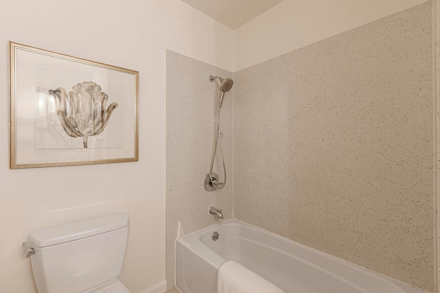 10995 Northseal Square Cupertino, CA 95014 - Photo 15 of 26 a bathroom with a bathtub and shower