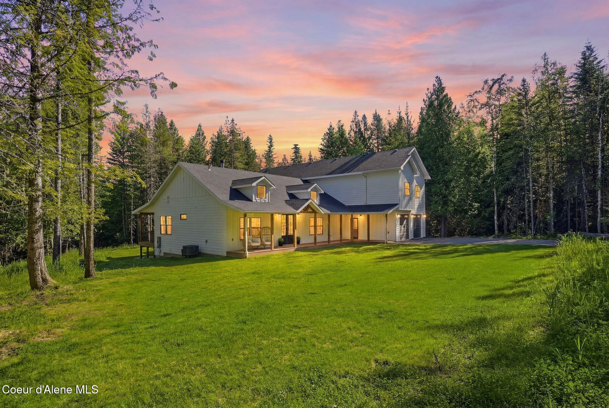 95 Klickitat Road Cocolalla, ID 83813 - Photo 3 of 66 Property is Surrounded with Mature Trees