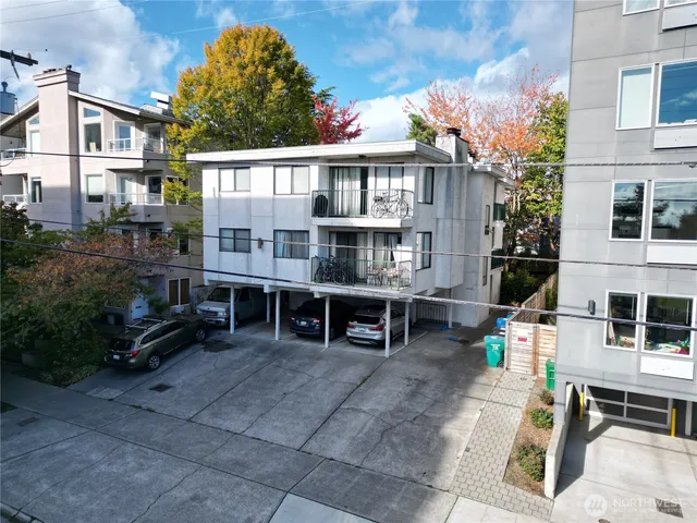 a view of a car park in front of house