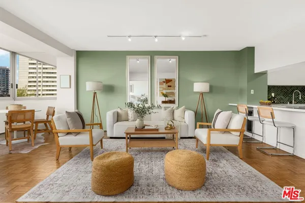 a living room with furniture and a table