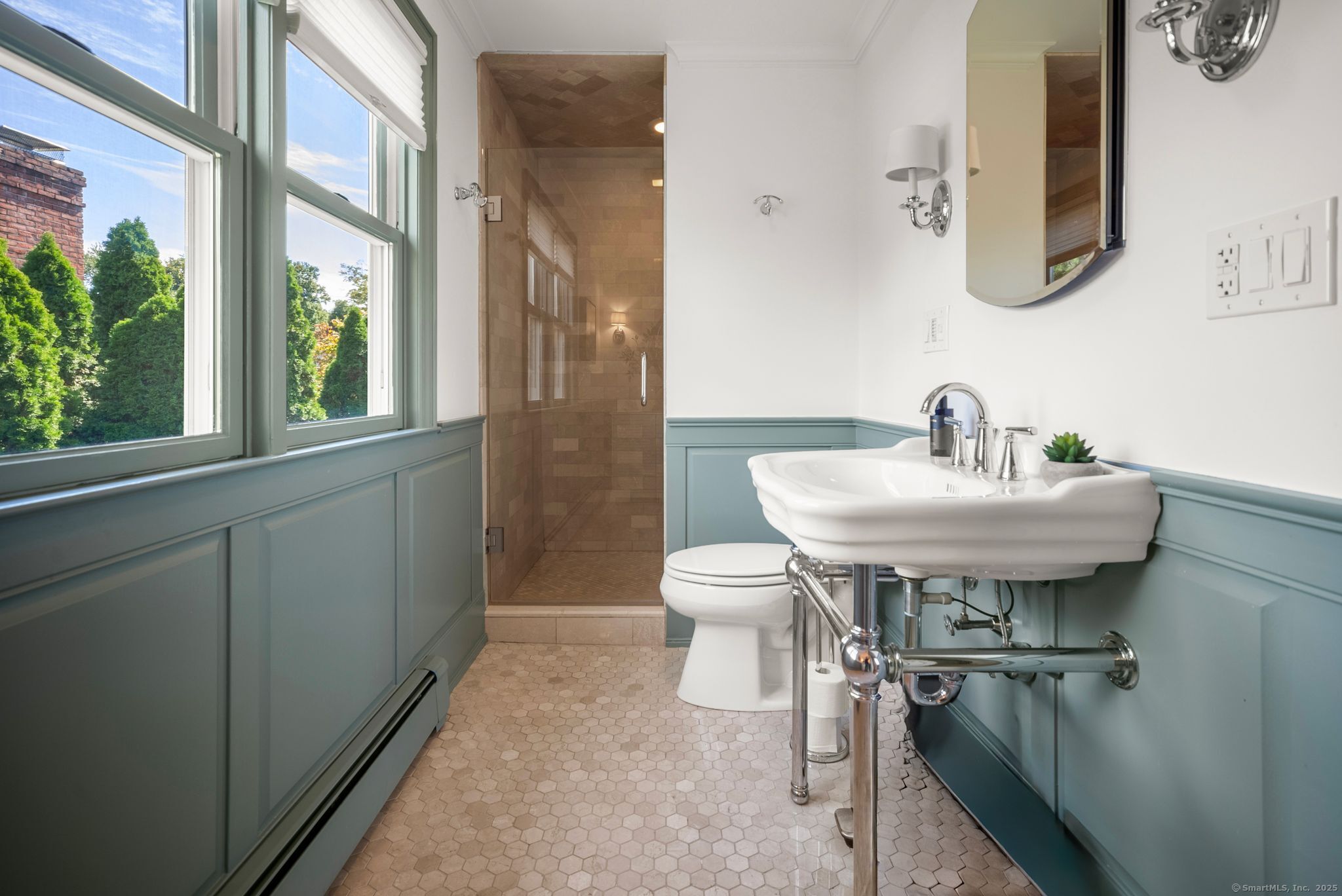 88 Overhill Road Fairfield, CT 06824 - Photo 23 of 37 a bathroom with a sink a toilet and a mirror