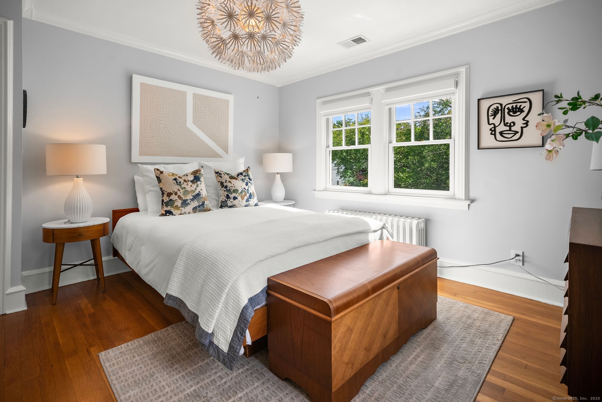 88 Overhill Road Fairfield, CT 06824 - Photo 26 of 37 a bed room with a bed and a lamp