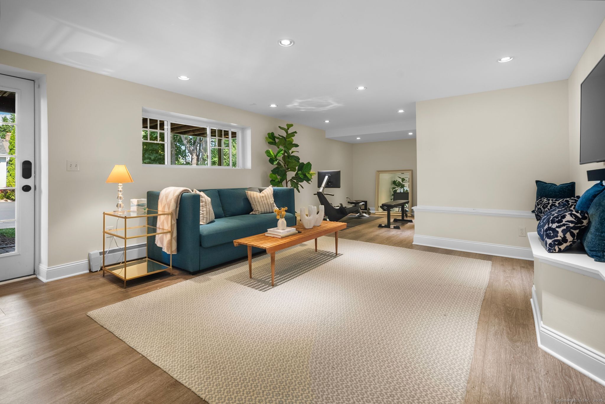 88 Overhill Road Fairfield, CT 06824 - Photo 31 of 37 a living room with furniture and a table