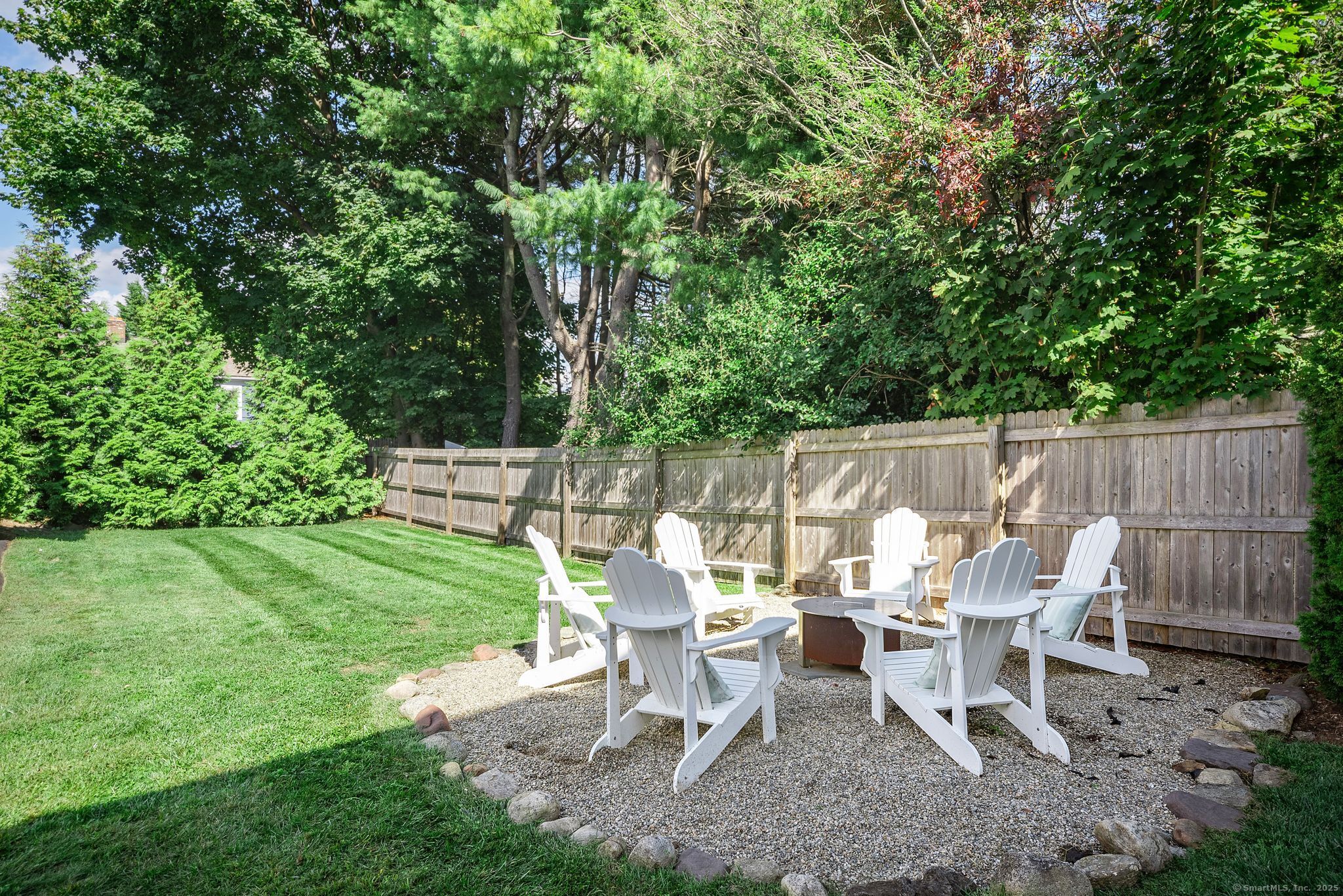 88 Overhill Road Fairfield, CT 06824 - Photo 36 of 37 a view of a tables and chairs in the garden