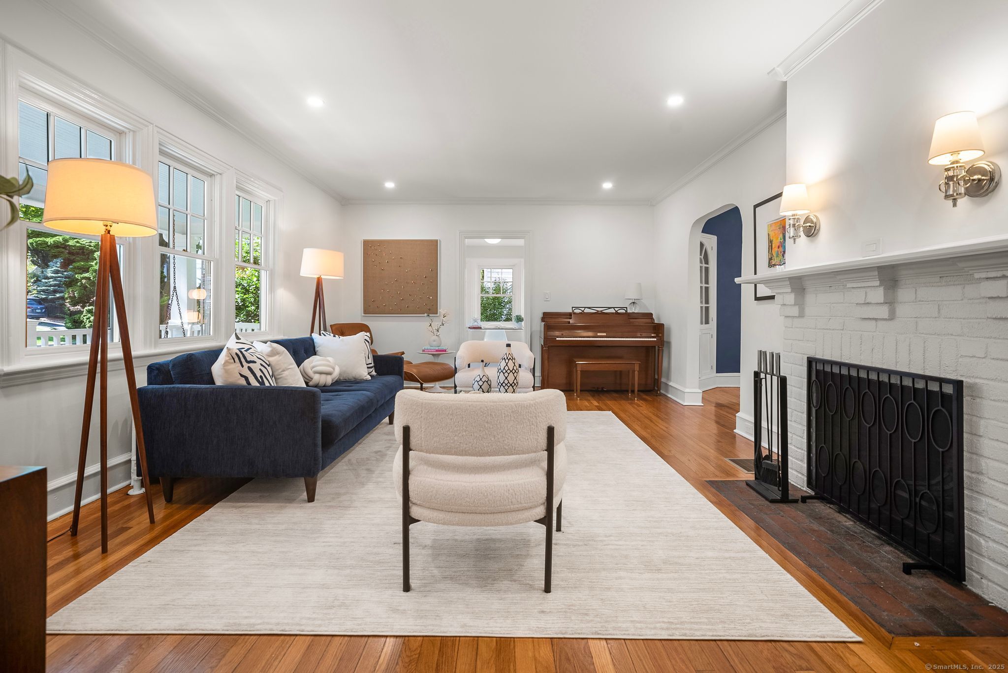 88 Overhill Road Fairfield, CT 06824 - Photo 4 of 37 a living room with furniture and a fireplace