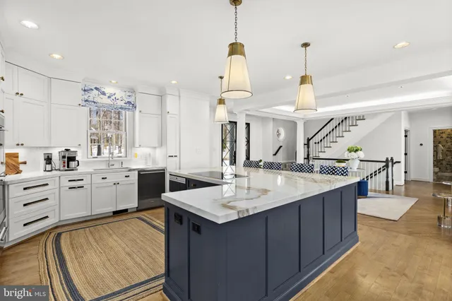a bedroom with furniture and a flat screen tv