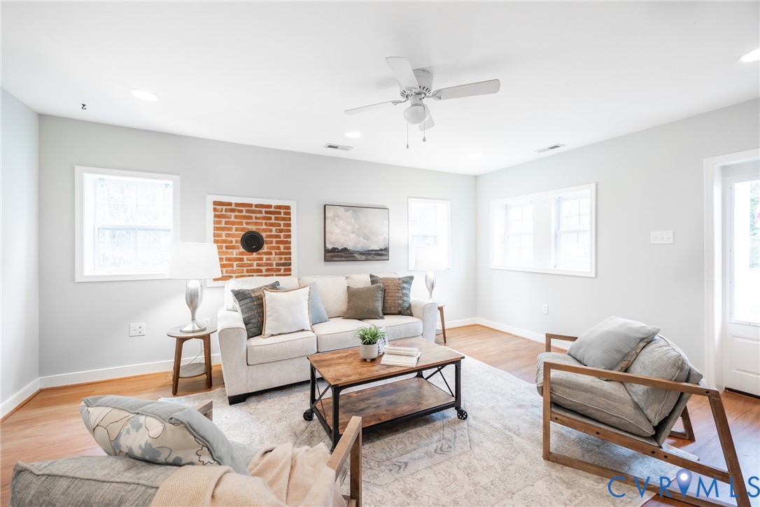 795 Snead Road Manakin-Sabot, VA 23103 - Photo 12 of 31 a living room with furniture and a large window