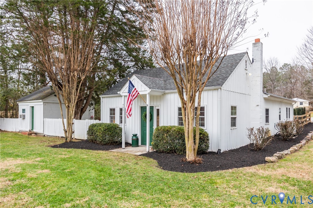 795 Snead Road Manakin-Sabot, VA 23103 - Photo 2 of 31 a front view of a house with a yard and garage