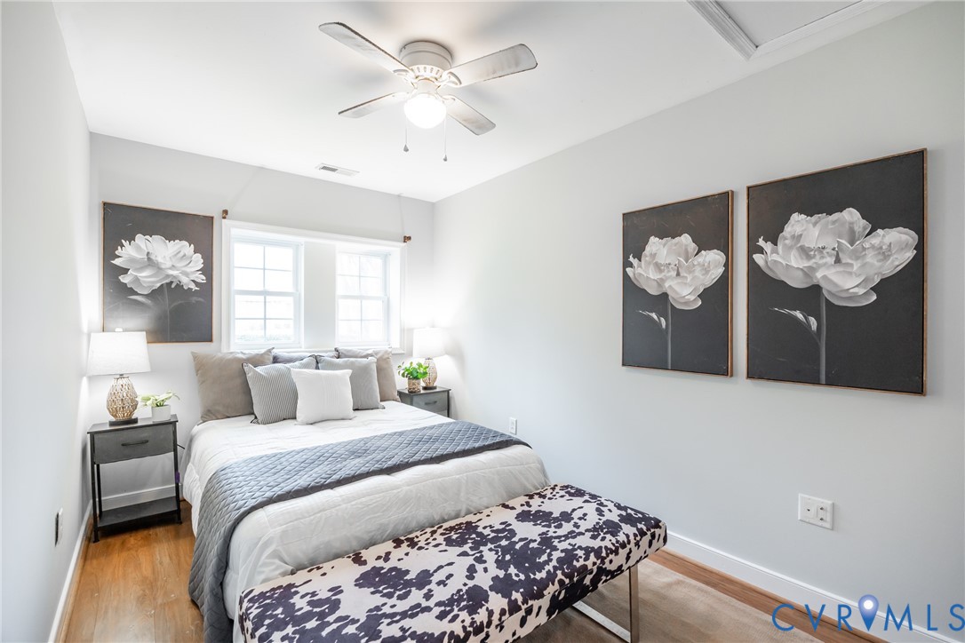 795 Snead Road Manakin-Sabot, VA 23103 - Photo 23 of 31 a bedroom with a bed and a chandelier