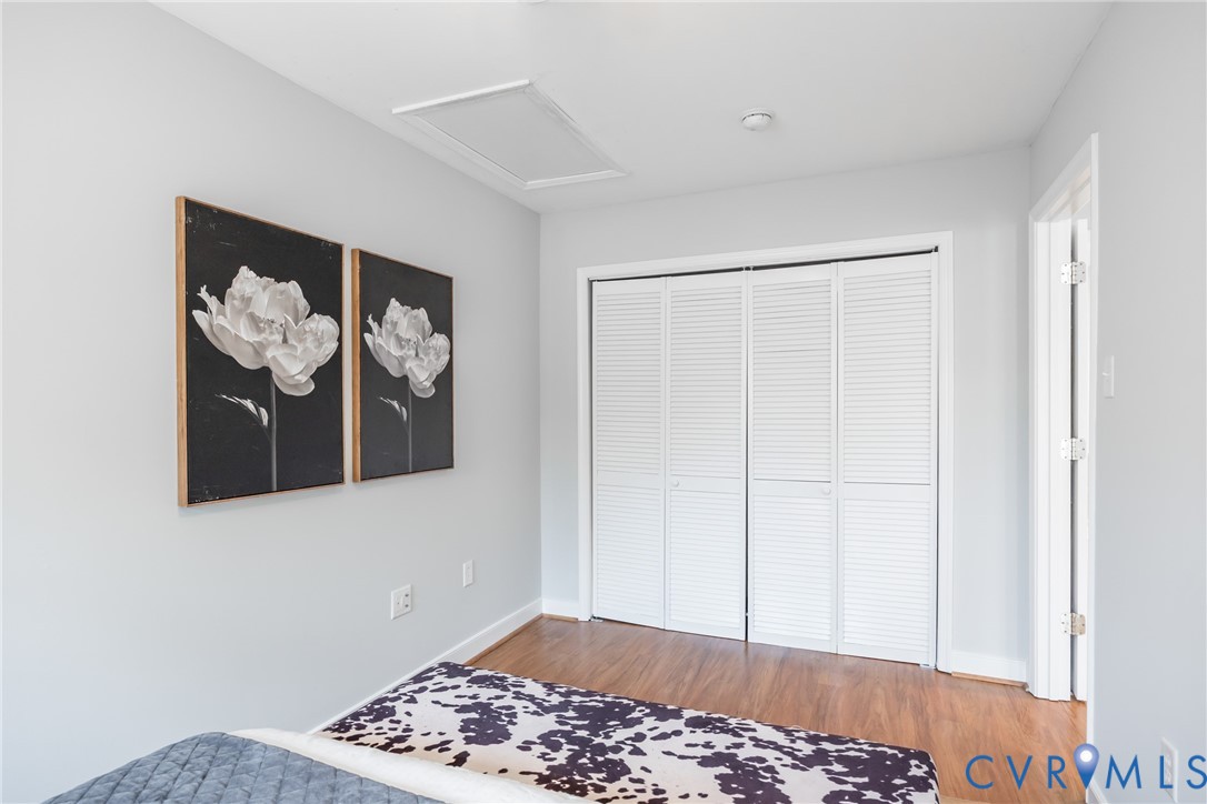 795 Snead Road Manakin-Sabot, VA 23103 - Photo 24 of 31 a view of a bedroom with wooden floor and cabinet