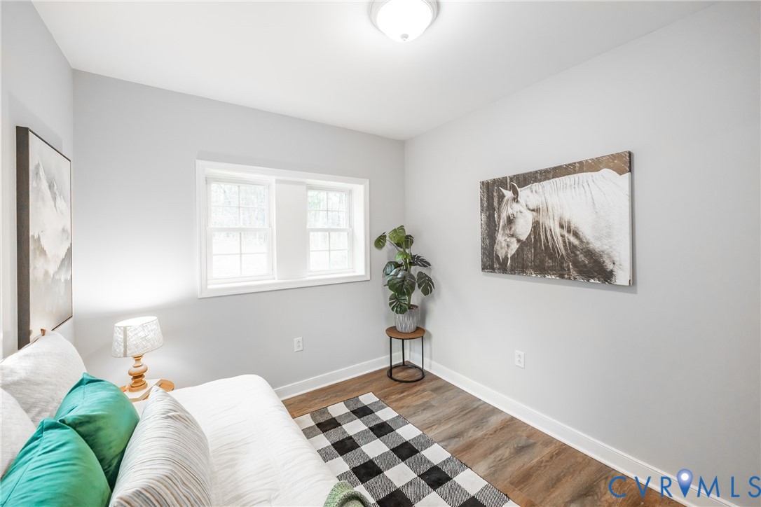 795 Snead Road Manakin-Sabot, VA 23103 - Photo 29 of 31 a bedroom with a bed and a window