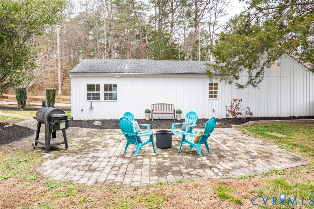 795 Snead Road Manakin-Sabot, VA 23103 - Photo 7 of 31 a view of a house with backyard and sitting area