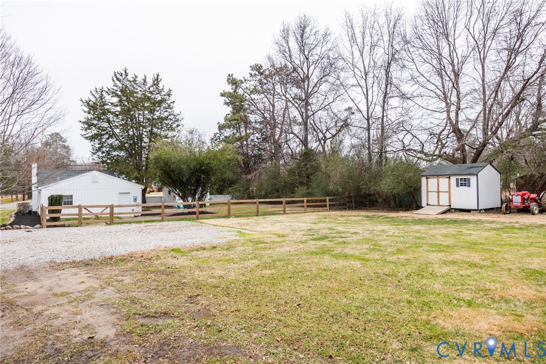 795 Snead Road Manakin-Sabot, VA 23103 - Photo 10 of 31 a view of a swimming pool with a house
