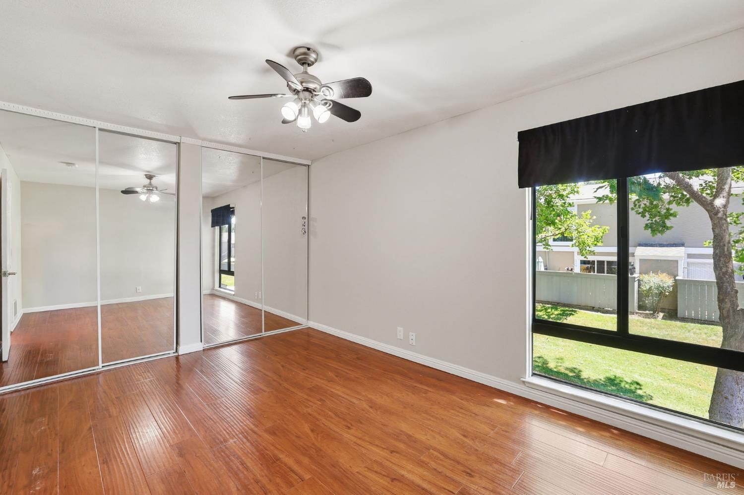900 Southampton Road, Unit 169 Benicia, CA 94510 - Photo 16 of 21 a view of interior space with wooden floor and windows