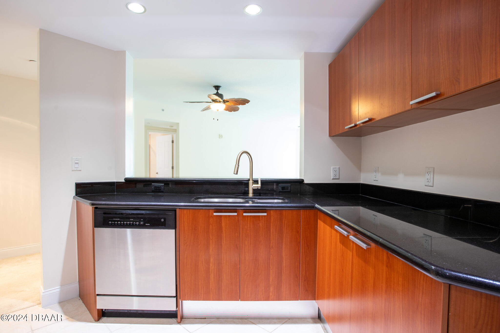 241 Riverside Drive Daytona Beach, FL 32117 - Photo 5 of 20 a sink with a close view of a sink and dishwasher