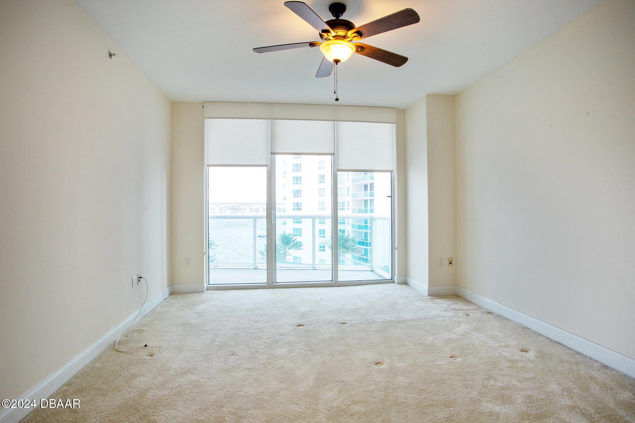 241 Riverside Drive Daytona Beach, FL 32117 - Photo 10 of 20 a view of an empty room with a window