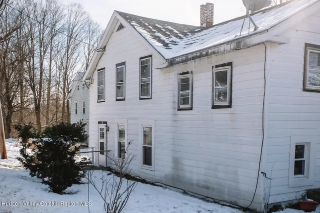 a view of a house with a patio