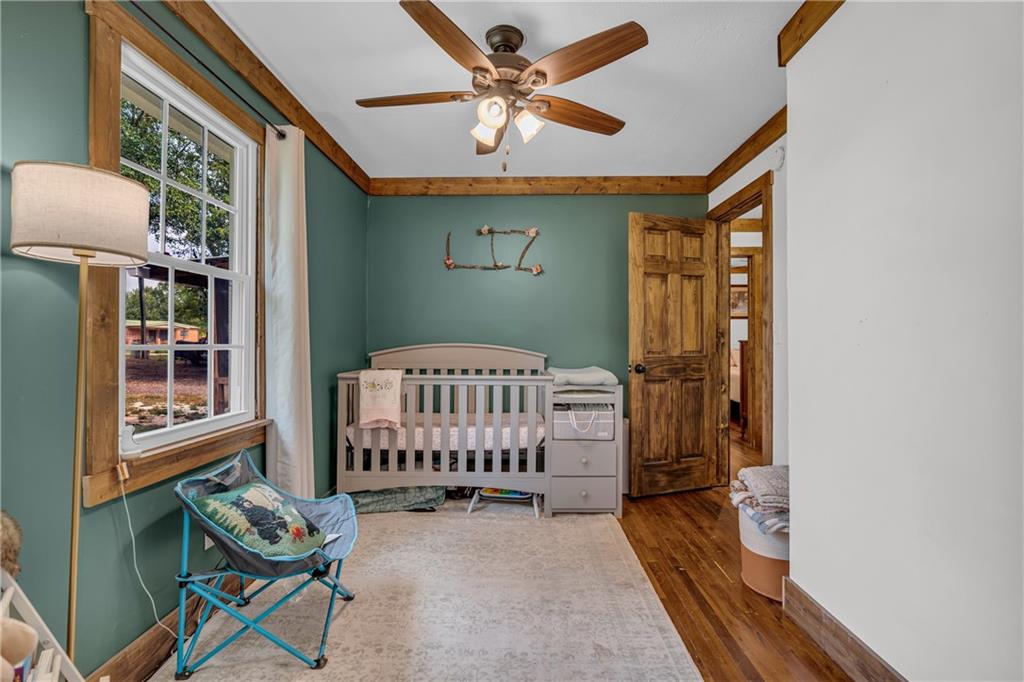 1334 Joe Bolton Road Commerce, GA 30530 - Photo 16 of 45 a living room with furniture and a window