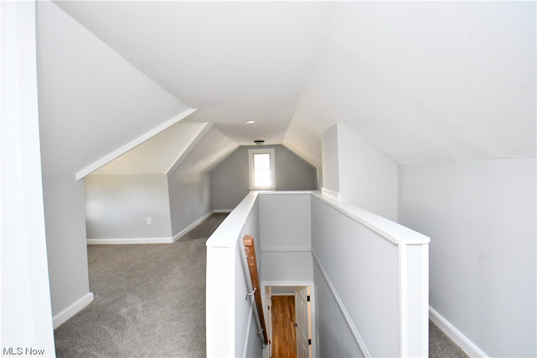 3193 Joslyn Road Cleveland, OH 44111 - Photo 33 of 41 Bonus room featuring vaulted ceiling and carpet floors