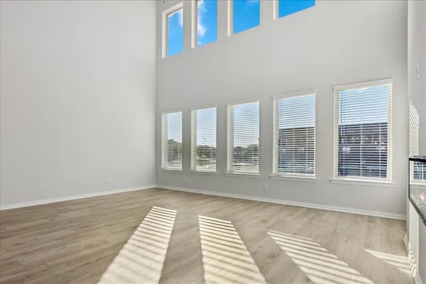 a view of a room with windows