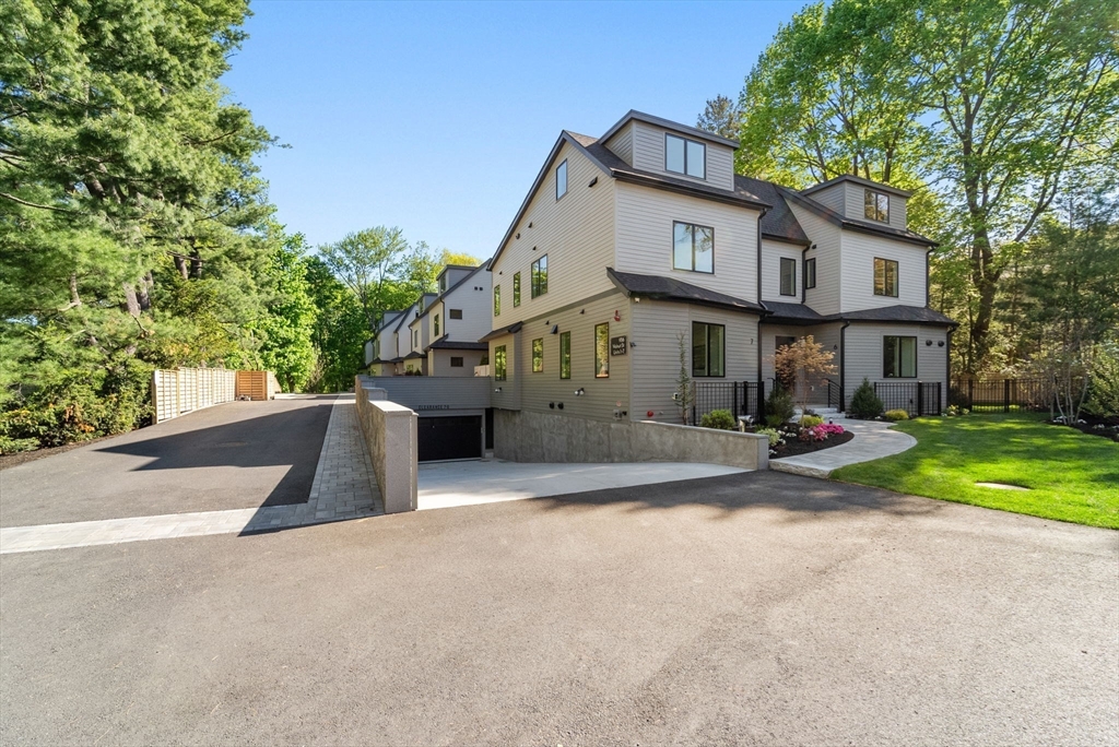 956 Walnut Street, Unit 7 Newton, MA 02461 - Photo 32 of 33 a view of a house with backyard and a tree