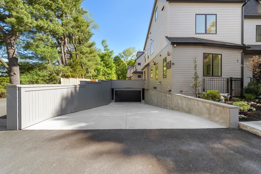 956 Walnut Street, Unit 7 Newton, MA 02461 - Photo 33 of 33 a view of a house with potted plants