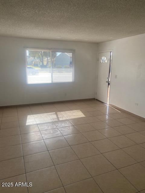 420 East Dunbar Drive Tempe, AZ 85282 - Photo 2 of 11 a view of an empty room with a window