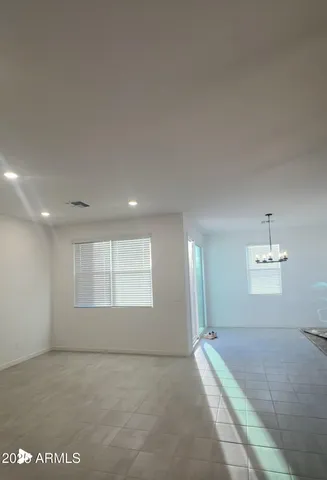 a view of a bathroom with a sink and mirror