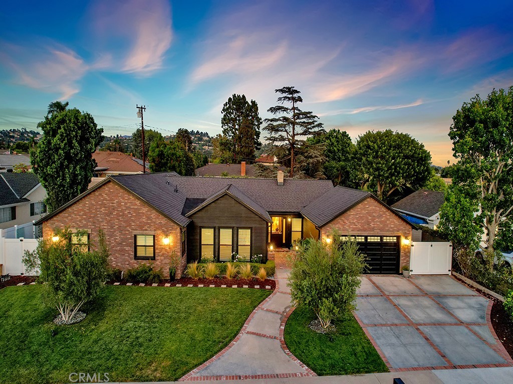 13862 Gimbert Lane North Tustin, CA 92705 - Photo 1 of 63 a front view of a house with a yard
