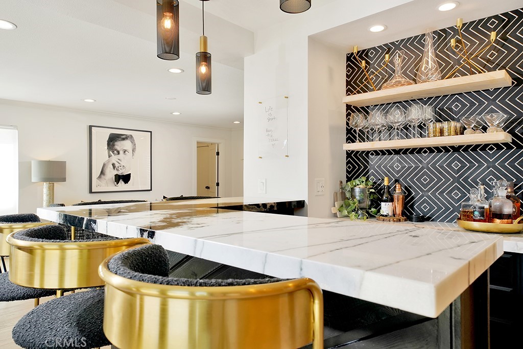 13862 Gimbert Lane North Tustin, CA 92705 - Photo 11 of 63 a living room with a couch and a potted plant