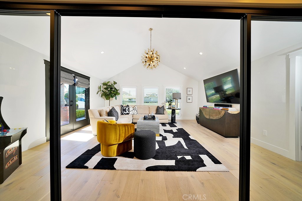 13862 Gimbert Lane North Tustin, CA 92705 - Photo 22 of 63 a living room with furniture and a flat screen tv