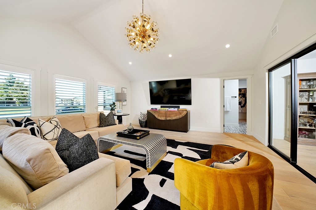 13862 Gimbert Lane North Tustin, CA 92705 - Photo 25 of 63 a living room with furniture floor and a flat screen tv
