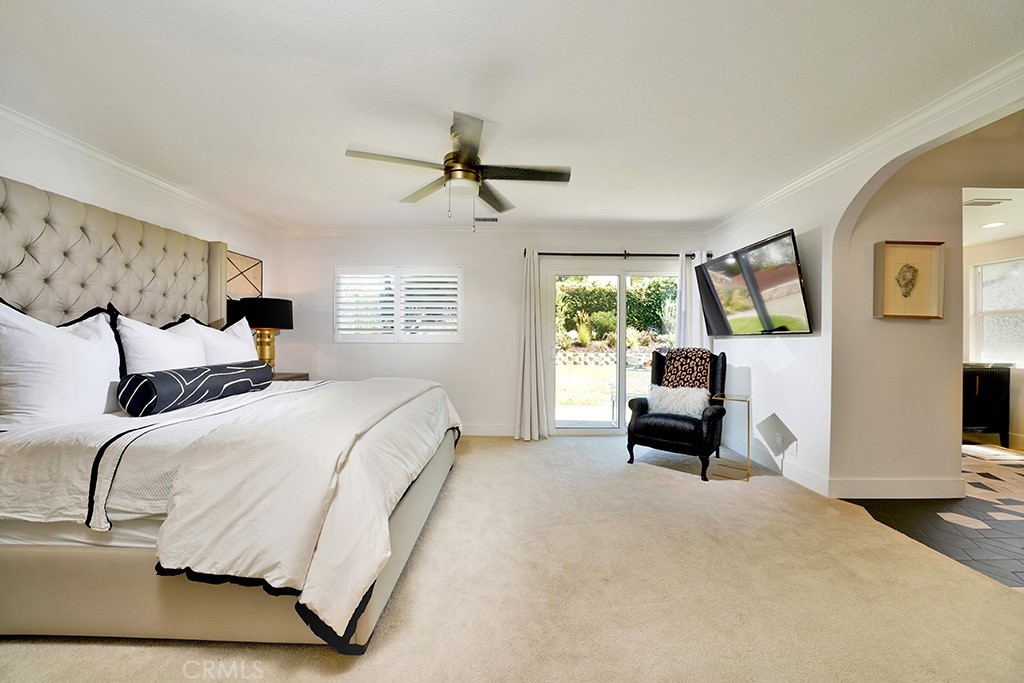 13862 Gimbert Lane North Tustin, CA 92705 - Photo 34 of 63 a bedroom with a large bed and a window