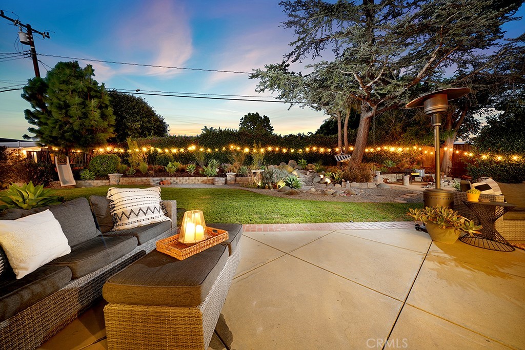 13862 Gimbert Lane North Tustin, CA 92705 - Photo 47 of 63 a view of a lake with couches and city view
