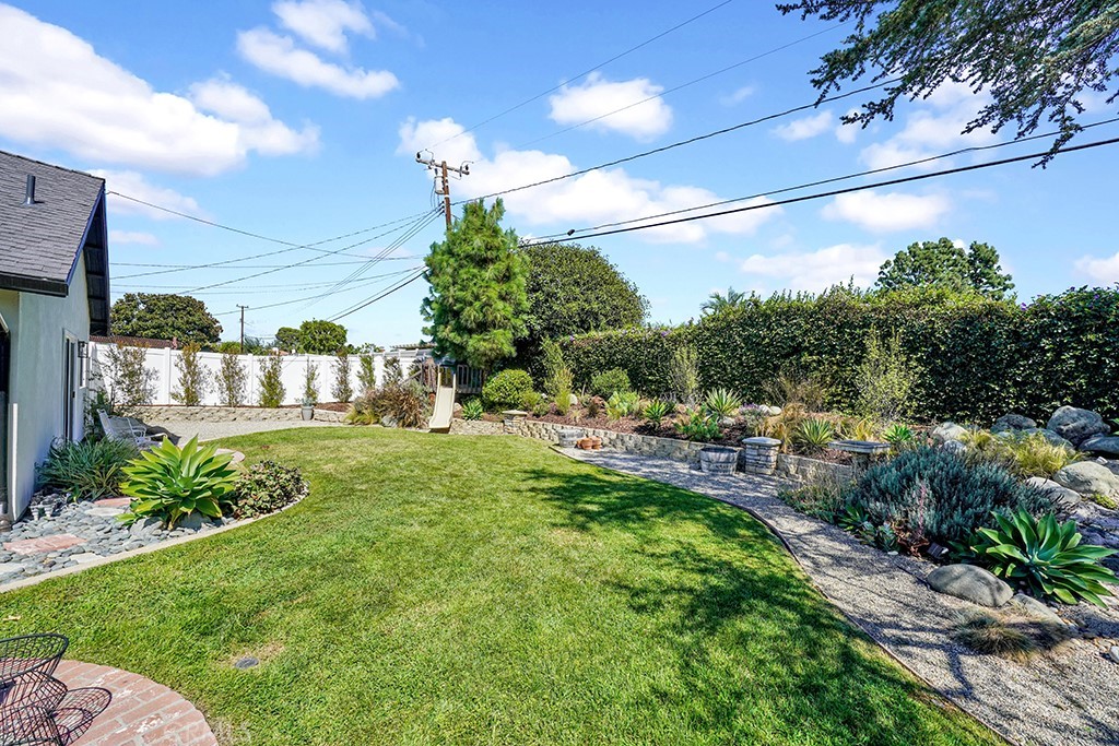 13862 Gimbert Lane North Tustin, CA 92705 - Photo 59 of 63 a backyard of a house with table and chairs