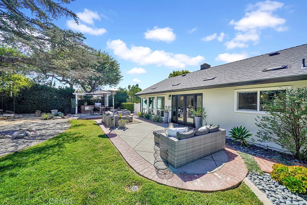 13862 Gimbert Lane North Tustin, CA 92705 - Photo 62 of 63 a view of a house with backyard porch and sitting area