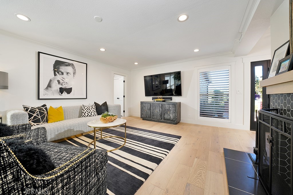 13862 Gimbert Lane North Tustin, CA 92705 - Photo 8 of 63 a living room with furniture and a flat screen tv