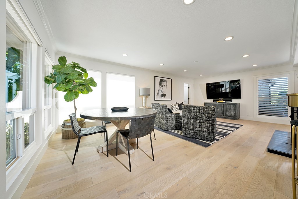13862 Gimbert Lane North Tustin, CA 92705 - Photo 9 of 63 a living room with furniture a large window and a flat screen tv